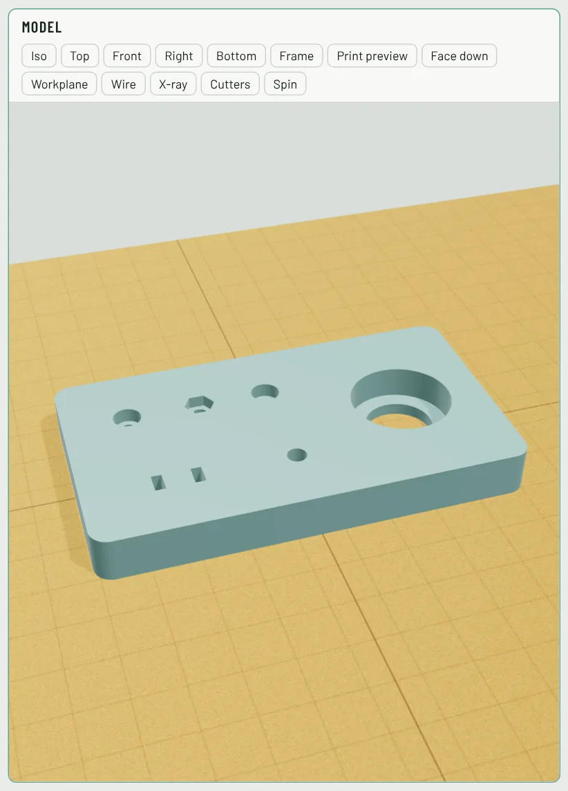 A plate with a counterbored screw hole, a nut trap, a magnet pocket, a bearing seat, a heat-set insert hole and zip-tie slots